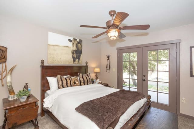 Main Home Guest Bedroom 1 with Queen Bed